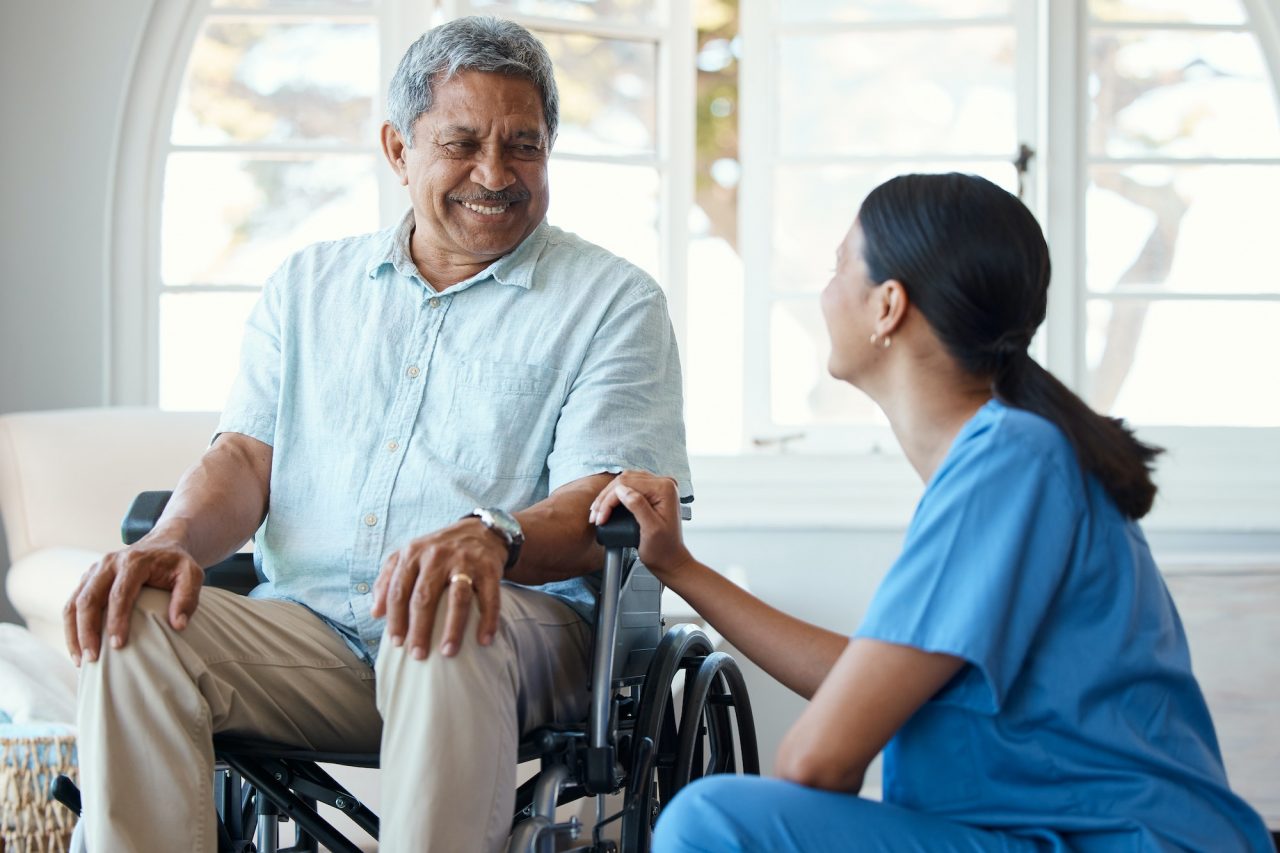 Cropped shot of a handsome senior man and his female nurse in the old age home